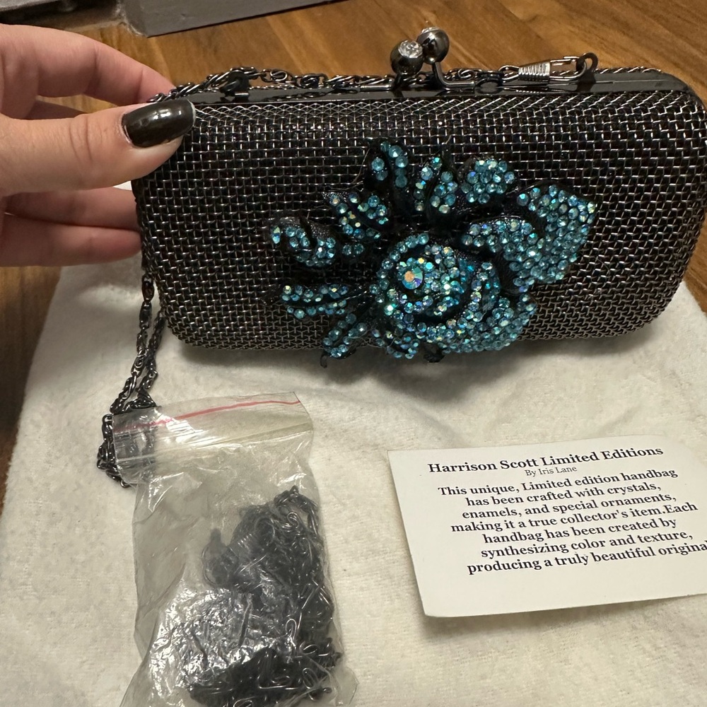 Iris Lane: Harrison Scott Black Clutch with Blue Crystal Flower